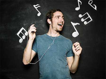 man against a chalkboard Foto de stock - Sin royalties Premium, Código: 640-02778369