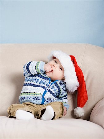 baby with a santa hat Stock Photo - Premium Royalty-Free, Code: 640-02778604