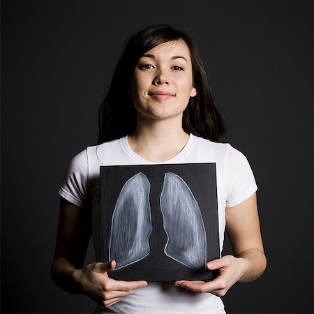 Woman with clean lungs Stock Photo - Premium Royalty-Free, Code: 640-02778814