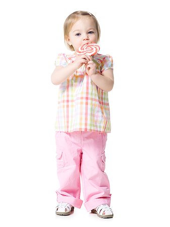 little girl with a lollipop Stock Photo - Premium Royalty-Free, Code: 640-02778877