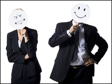 simsearch:640-01366162,k - Businessman and businesswoman holding expression masks Foto de stock - Sin royalties Premium, Código: 640-02770095