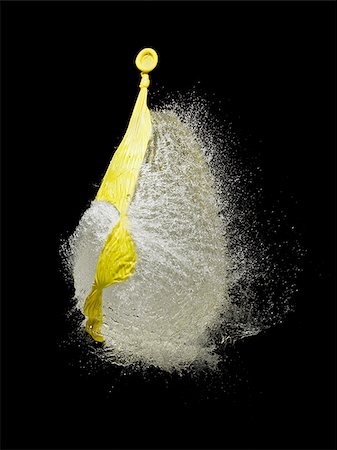 Exploding balloon Stock Photo - Premium Royalty-Free, Code: 640-02770381