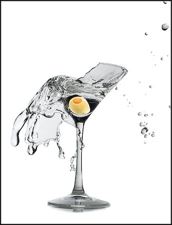 Exploding martini glass Stock Photo - Premium Royalty-Free, Code: 640-02770409