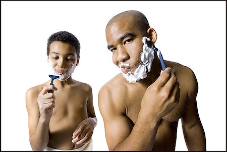 father and son shaving - Father and son shaving together Stock Photo - Premium Royalty-Free, Code: 640-02770416