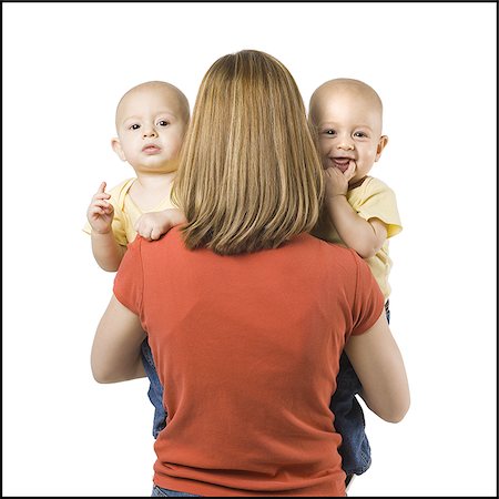 sibling newborn parent - Mother with twin babies Stock Photo - Premium Royalty-Free, Code: 640-02770878