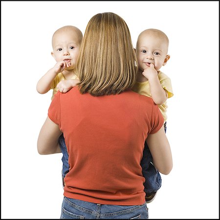 sibling newborn parent - Mother with twin babies Stock Photo - Premium Royalty-Free, Code: 640-02770879