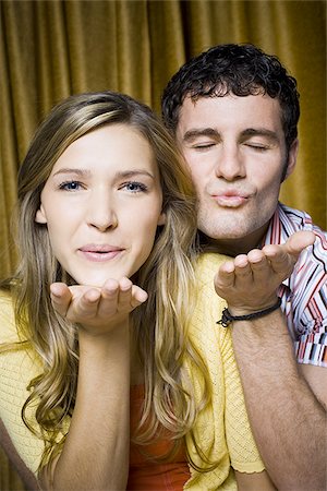 photobooth - Couple in photo booth laughing Stock Photo - Premium Royalty-Free, Code: 640-02770934