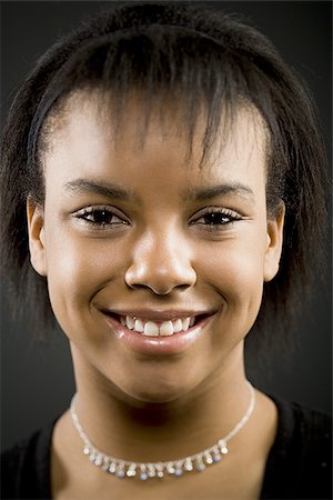simsearch:640-02773530,k - Closeup of girl smiling Stock Photo - Premium Royalty-Free, Code: 640-02772238