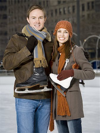 Couple with skates outdoors in winter Stock Photo - Premium Royalty-Free, Code: 640-02772444