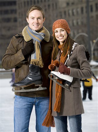 Couple with skates outdoors in winter Stock Photo - Premium Royalty-Free, Code: 640-02772445