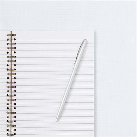 pad of paper - Spiral notebook with pen Stock Photo - Premium Royalty-Free, Code: 640-02772839