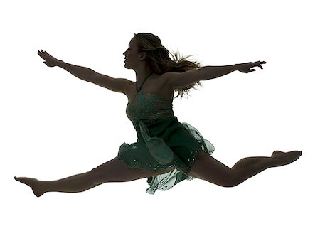 Side profile silhouette of ballerina leaping Stock Photo - Premium Royalty-Free, Code: 640-02773080
