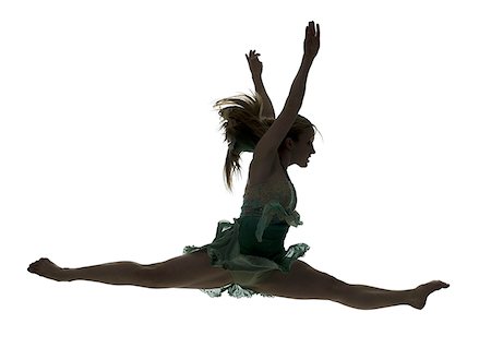 Side profile silhouette of ballerina leaping Stock Photo - Premium Royalty-Free, Code: 640-02773081