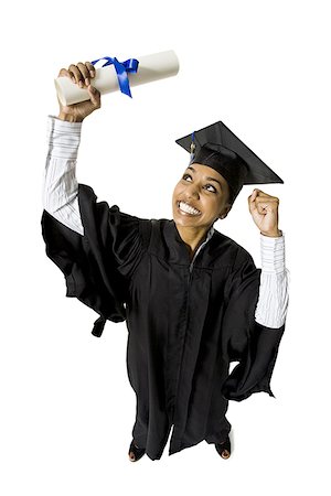 Woman in graduation gown and Blank Sign with diploma excited Stock Photo - Premium Royalty-Free, Code: 640-02773268