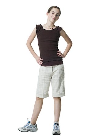 simsearch:640-02773530,k - Girl standing with hands on hips Stock Photo - Premium Royalty-Free, Code: 640-02773307