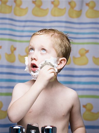 shaving kids boys - Boy shaving in bathroom Stock Photo - Premium Royalty-Free, Code: 640-02773638