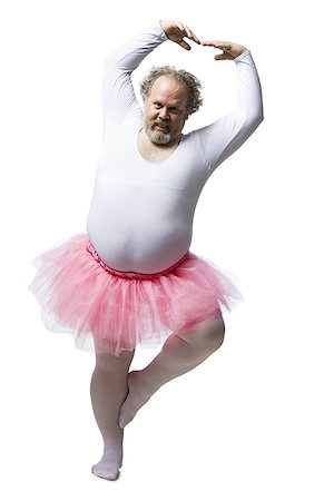 dancing ballerina man - Obese man in tutu dancing and smiling Stock Photo - Premium Royalty-Free, Code: 640-02773771