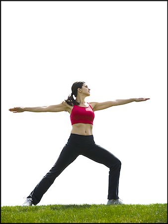 Profile of woman stretching outdoors Stock Photo - Premium Royalty-Free, Code: 640-02773872