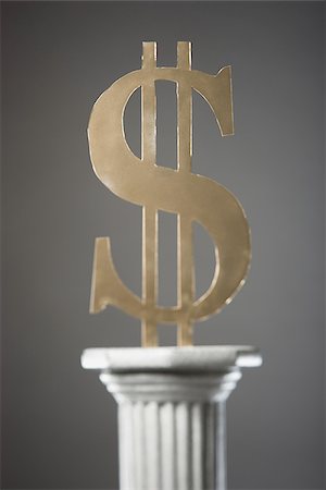 dollar signs - money on a pedestal Stock Photo - Premium Royalty-Free, Code: 640-02947700