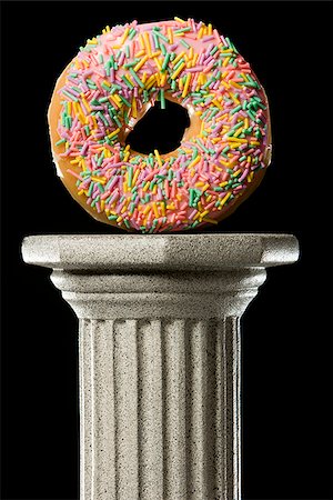 sprinkles - donut on a pedestal Stock Photo - Premium Royalty-Free, Code: 640-02947723