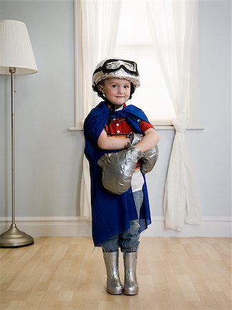 little boy playing dress up Stock Photo - Premium Royalty-Free, Code: 640-02949134