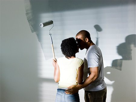 couple painting a room Stock Photo - Premium Royalty-Free, Code: 640-02949868