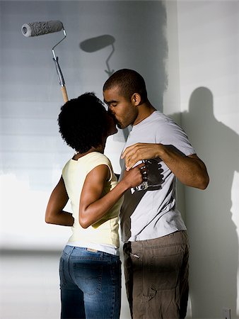 couple painting a room Stock Photo - Premium Royalty-Free, Code: 640-02949869