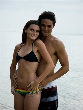 young couple at the beach Stock Photo - Premium Royalty-Free, Code: 640-02949907