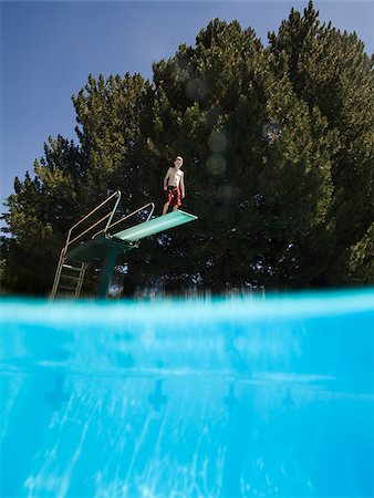 diving board - boy on a diving board Stock Photo - Premium Royalty-Free, Code: 640-02951342