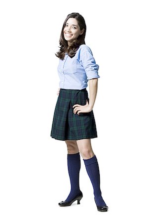 plaid skirt - woman in a school girl outfit Stock Photo - Premium Royalty-Free, Code: 640-02951625