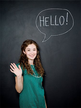 quote - woman saying hello Stock Photo - Premium Royalty-Free, Code: 640-02952010