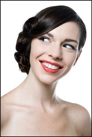 red lipstick - woman with her hair up in a classic hollywood hairstyle reminiscent of the 1940s Stock Photo - Premium Royalty-Free, Code: 640-02952463