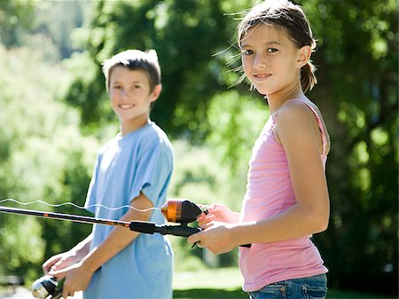brother and sister fishing Stock Photo - Premium Royalty-Free, Code: 640-02952948