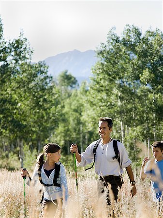 sports and hiking - father hiking with his two kids Stock Photo - Premium Royalty-Free, Code: 640-02952956