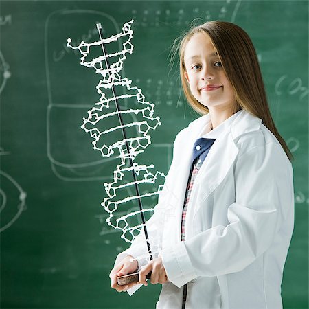 double helix - girl in a classroom with a model of a DNA double helix Stock Photo - Premium Royalty-Free, Code: 640-02953044