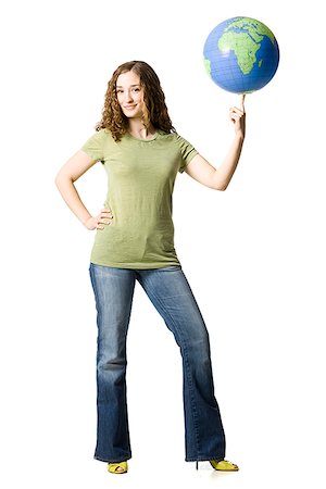 woman spinning a globe on her finger Stock Photo - Premium Royalty-Free, Code: 640-02953236