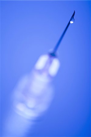 Closeup of syringe Stock Photo - Premium Royalty-Free, Code: 640-03255762