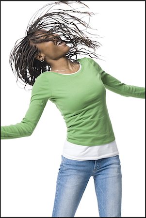 simsearch:640-03265333,k - Woman with braided hair dancing Stock Photo - Premium Royalty-Free, Code: 640-03255836