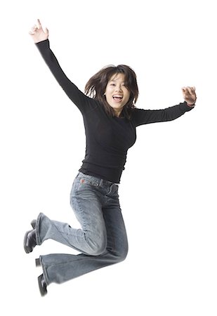 simsearch:640-03265333,k - Casually dressed woman leaping Stock Photo - Premium Royalty-Free, Code: 640-03255956