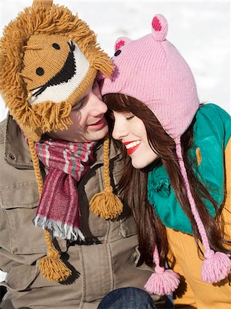 Orem, Utah, USA, boyfriend and girlfriend wearing funny knit hats, embracing Stock Photo - Premium Royalty-Free, Code: 640-03256357