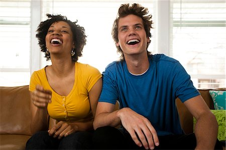 USA, Utah, Provo, young couple watching television in living room Stock Photo - Premium Royalty-Free, Code: 640-03256596