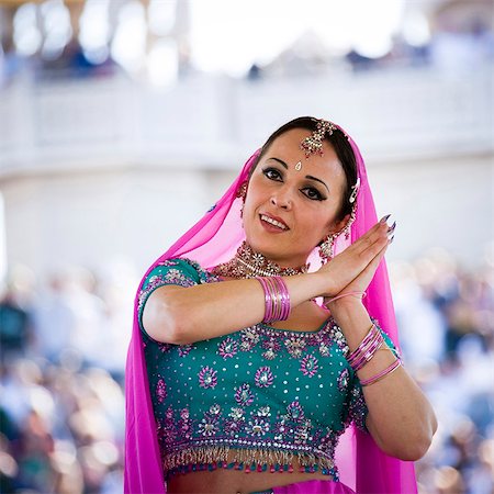 USA, Utah, Spanish Fork, portrait of mid adult dancer in traditional clothing performing on stage Stock Photo - Premium Royalty-Free, Code: 640-03257169