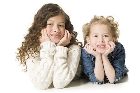 simsearch:640-03263432,k - Sisters posing and smiling Stock Photo - Premium Royalty-Free, Code: 640-03258168