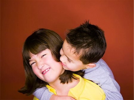 simsearch:640-03263432,k - Little brother kissing older sister Stock Photo - Premium Royalty-Free, Code: 640-03258307