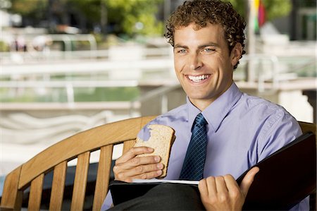 Businessman on park bench Stock Photo - Premium Royalty-Free, Code: 640-03258858