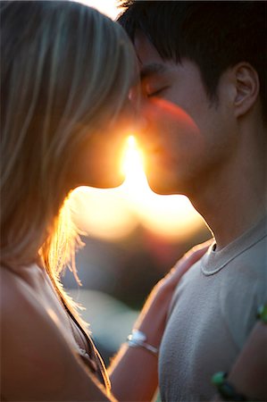 Young couple about to kiss Stock Photo - Premium Royalty-Free, Code: 640-03259867