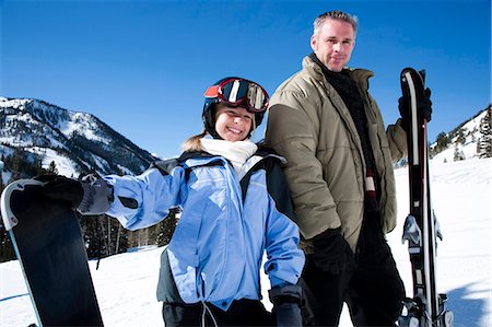 simsearch:640-03264331,k - A father and his daughter outside in the snow Stock Photo - Premium Royalty-Free, Code: 640-03264198