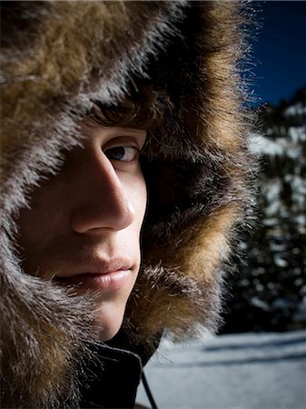 Teenage boy outside in the snow Stock Photo - Premium Royalty-Free, Code: 640-03264307