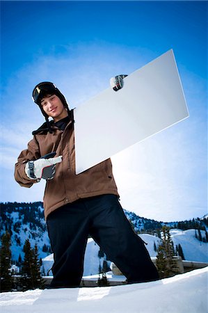 simsearch:640-03264331,k - Male in the snow with a blank sign Stock Photo - Premium Royalty-Free, Code: 640-03264328