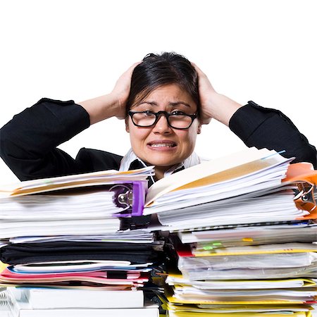 person overwhelmed stresss - Woman with stack of binders and paperwork Stock Photo - Premium Royalty-Free, Code: 640-03264415